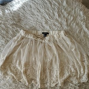 White lace skirt
